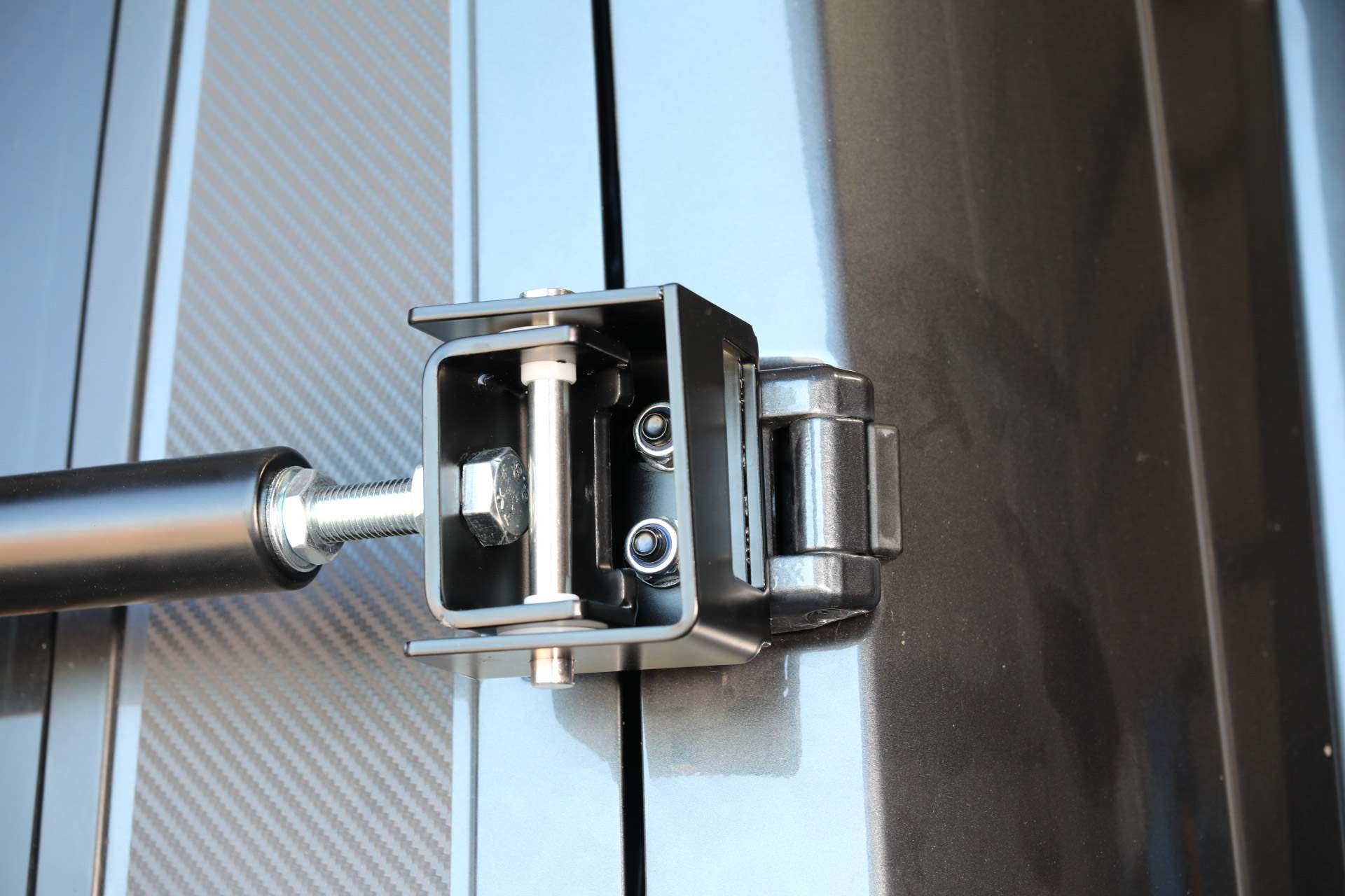 Fixation sur charnières pour porte-vélo